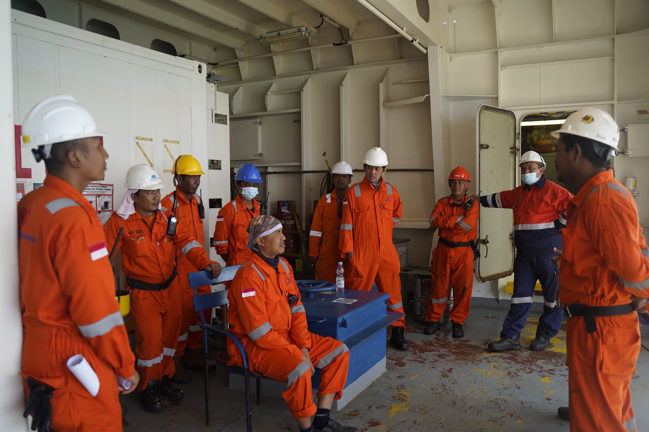 SGI crew gathered for a briefing on deck