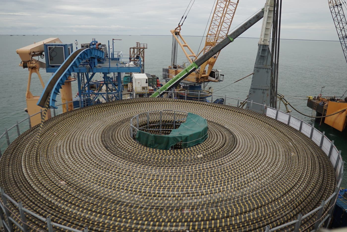 Submarine cable coiled in the cable tank